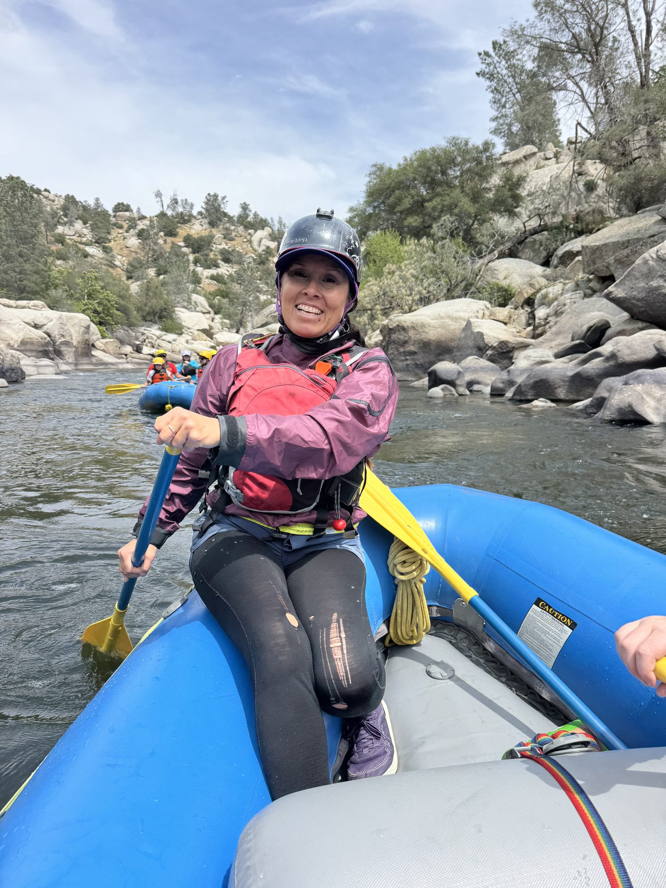 Daneya Williams paddling through whitewater on the Kern River